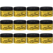 Masons Dog Oil Massaging Balm 100g tub on a wooden surface next to a dog
