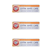 Arm & Hammer Extra White Care Toothpaste 125g tube on a clean bathroom shelf
