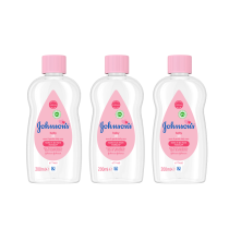 Johnson's Baby Oil Pure and Gentle Care 200ml bottle on a clean nursery shelf
