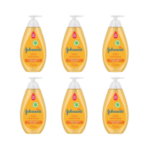 Johnson's Baby Shampoo 750ml bottle on a clean bathroom shelf beside baby bath products
