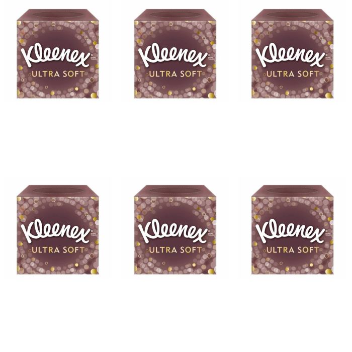 Kleenex Ultra Soft Facial Tissues box on a clean bedside table
