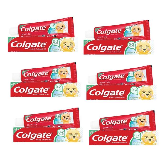 Colgate Baby Strawberry Toothpaste 0-2 Years 50ml tube on a bathroom shelf
